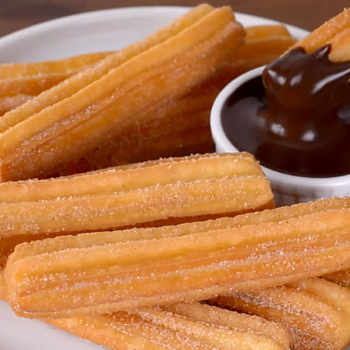 Churro - Mexican deep-fried dough sticks Cake - Spanish deep-fried dough sticks - Gisco